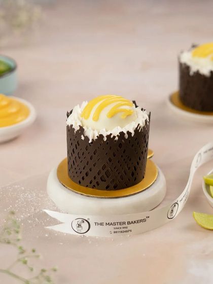 A truly unique creation, our Chocolate Lemonade pastry. A rich chocolate cup holds a zesty, refreshing lemon cream, offering a surprising and delightful flavor combination.