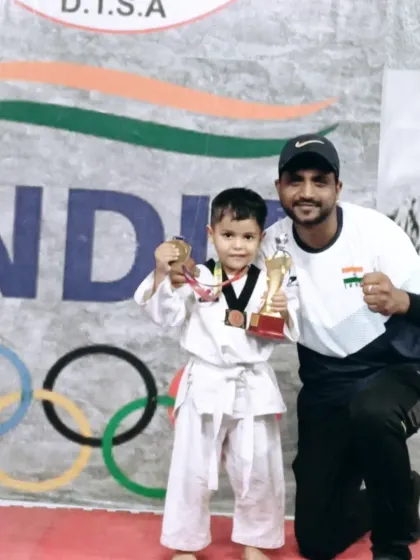 I don't just train students, I build champions. Here is one of my youngest champs with his first trophy and medal after a big win. His journey is just beginning.