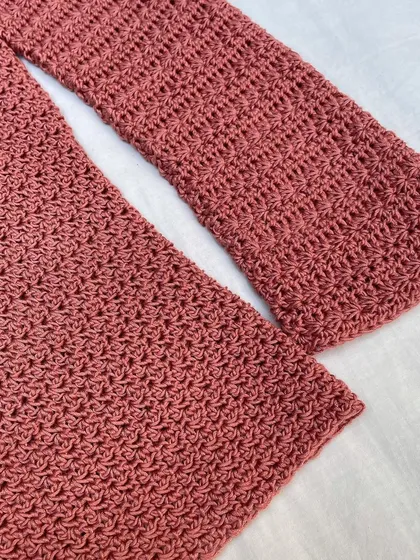 A close-up of the beautiful star stitch on the Etoile Sweater's sleeve. I put a lot of love into getting these details just right, ensuring every handmade piece is special and high-quality.