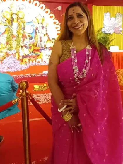A patron looking radiant during Durga Puja in one of our custom-fit crochet blouses. We love creating pieces that become a part of your most cherished festive memories.