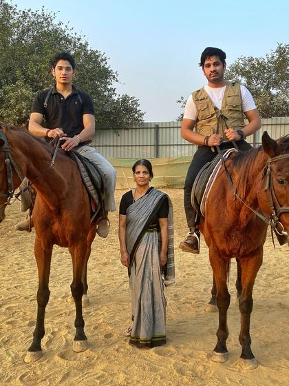 A family moment at the club. Horse riding is an activity that can bring generations together.