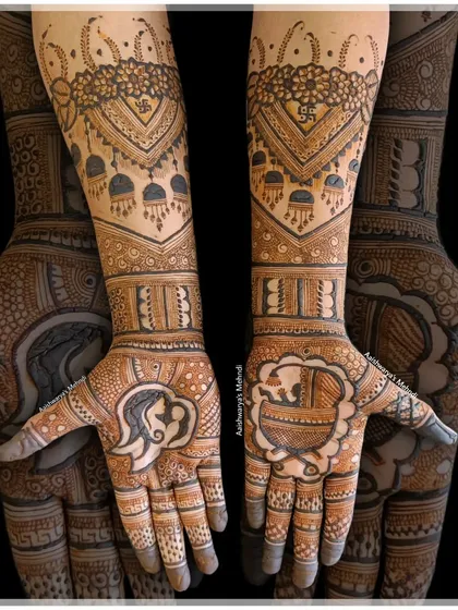 A complete baby shower design with a mother and child on one palm and a baby in a cradle on the other, tied together with traditional patterns on the arms.