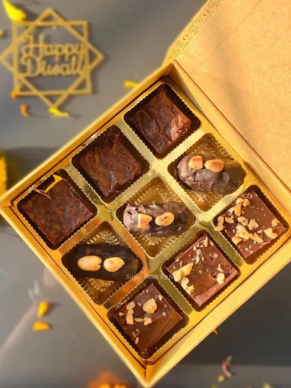 The Diwali 'Sweet Box' with a mix of chocolate brownies, peanut butter stuffed dates, and chocolate walnut fudge. A perfect blend of flavors.