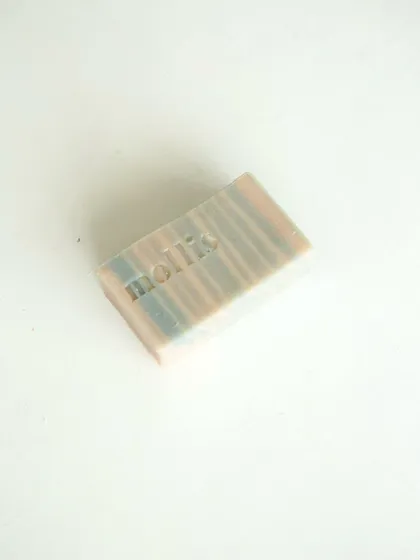 My Sweet Orange & Patchouli bar, with elegant layers that look like a sunset in motion.