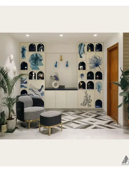 Art is at the core of our design philosophy. This custom bookshelf features hand-painted shutters by a collaborating artist, transforming a functional storage unit into a unique piece of nature-themed artwork that defines the room.