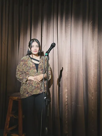 Beyond the arguments and evidence, there is a poet. On the open mic stage, I share my other voice through Hindi and Urdu shayari, connecting with a different kind of truth.