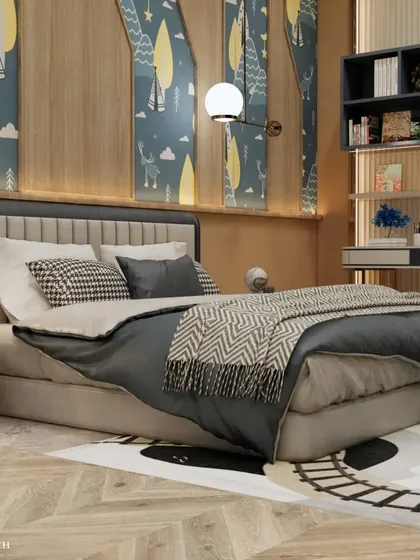 The bed area features a custom headboard and a fun, train-track-themed rug. The mix of patterns and textures, from the wallpaper to the bedding, creates a visually engaging and cozy environment.