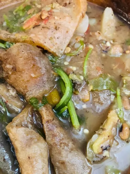 This is a curry made with buff skin and mixed vegetables. The skin becomes tender and absorbs all the flavors of the potato curry.