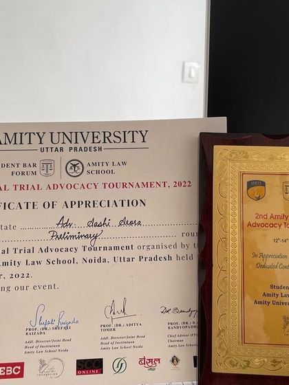 This certificate and memento are from when I judged the 2nd Amity National Trial Advocacy Tournament in 2022. I am grateful for these opportunities to engage with the academic legal community.