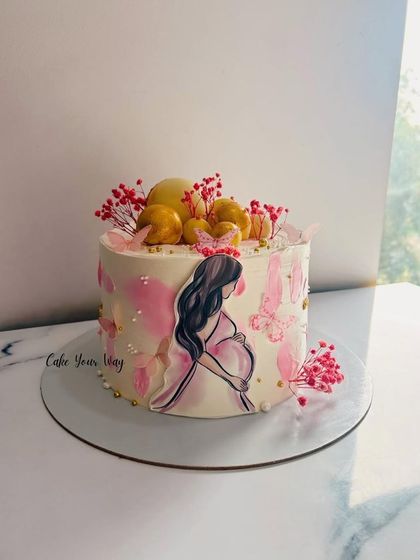 For the mom-to-be who deserves all the love (and cake). A beautiful cake celebrating motherhood.