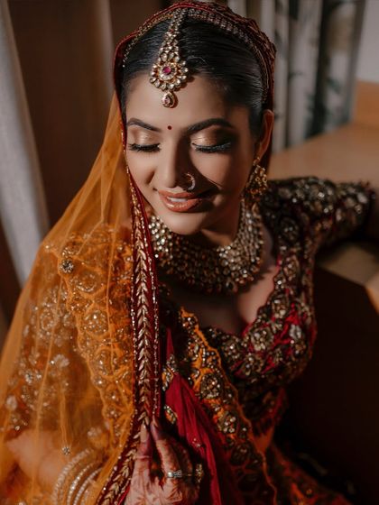 A dreamy, soft-focus bridal portrait. I created a warm, glowing look with a touch of shimmer on the eyes to capture a romantic and ethereal feeling.