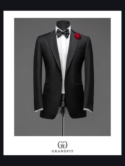 The tuxedo as a work of art. This studio shot on a mannequin highlights the architectural lines, from the sculpted shoulders to the sweep of the lapels.