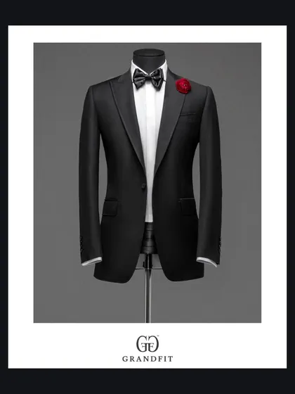 The tuxedo as a work of art. This studio shot on a mannequin highlights the architectural lines, from the sculpted shoulders to the sweep of the lapels.