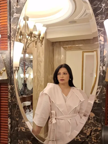 A moment of self-reflection. This outfit, a structured trench-style top, is a statement in authentic, personal style.