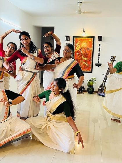 The Guruvayur ensemble posing as Krishna and his Gopikas during a fun moment in rehearsal for our "Ashtapadi."