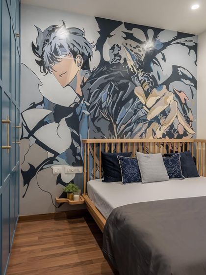 A detailed shot of the mural and the custom-designed wardrobe, showing the harmony between art and functional furniture.