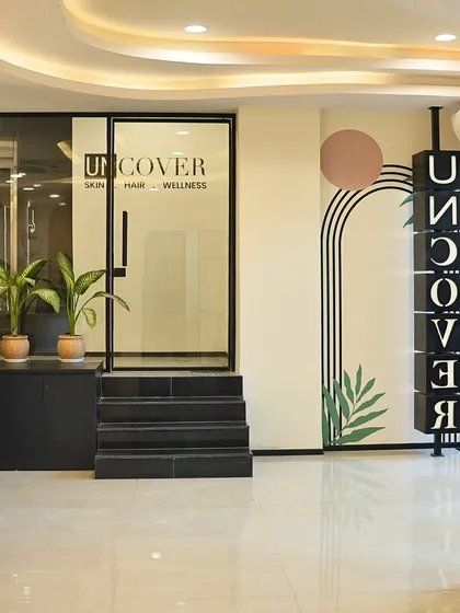 Another angle of our Noida clinic entrance, showing the modern design and plant accents.