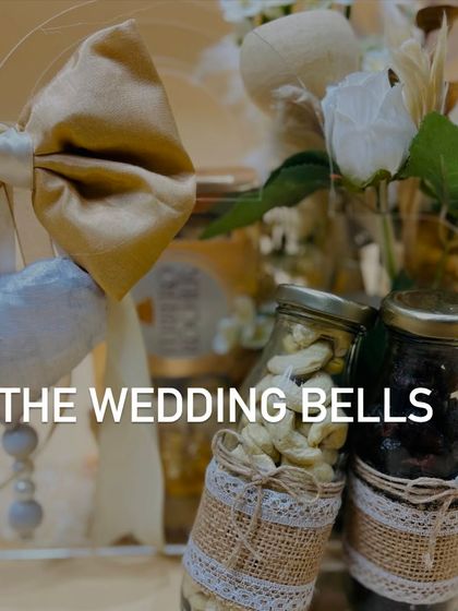 The details matter. Here you can see the jute and lace wrapping on the dry fruit jars, adding a rustic yet elegant touch to our Rakhi hamper.