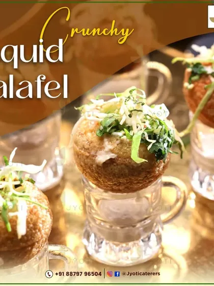 A creative take on pani puri, this Crunchy Liquid Falafel is served in shot glasses. The liquid base is topped with a crispy falafel ball for a surprising burst of flavour and texture.