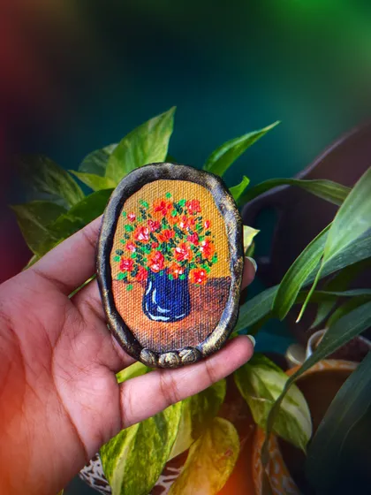 This hand-painted floral magnet is a perfect example of the art I love to create. Each piece is a tiny canvas, complete with a hand-shaped clay border, designed to bring a little bit of beauty to your everyday spaces.