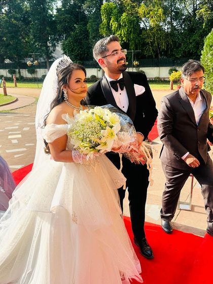 My beautiful white bride, ready to walk the red carpet. The makeup is subtle and beautiful, with a focus on enhancing her natural features.