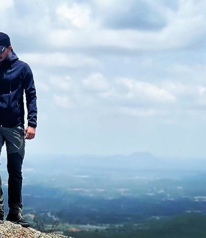 The same contemplative pose at Shivagange, a perfect spot for photography and soaking in the scenery.