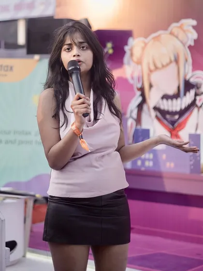 The event anchor engaging with the audience at Comic Con. I cover all aspects of an event, including hosts, speakers, and performers.