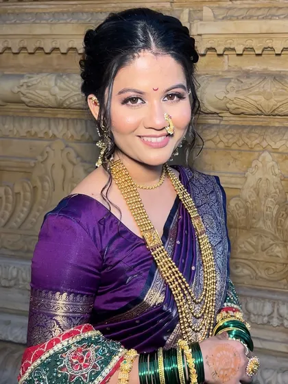A close-up portrait of my sister's court marriage look. The makeup is kept fresh and minimal, with a focus on clean skin and defined eyes to match the grace of a modern Marathi bride.