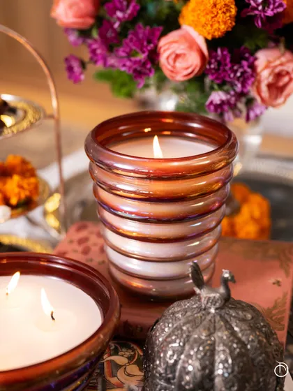 Your home deserves to be a personal space of boundless peace. My Scented Utopia candles, with their iridescent stacked design, evoke the essence of a lush forest, redolent of peach nectar, sage leaf, and sensual blonde wood.
