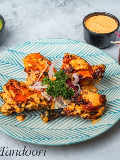 The Sikanderi Tandoori is a unique sweet and spicy chicken dish. The chicken is marinated and cooked in the tandoor, then coated in a special sauce for a balanced flavour.