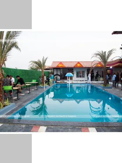 The pool and patio area of Rock Villa, designed for social gatherings. The layout provides ample space for seating and mingling, making it a functional and beautiful hub for the resort.
