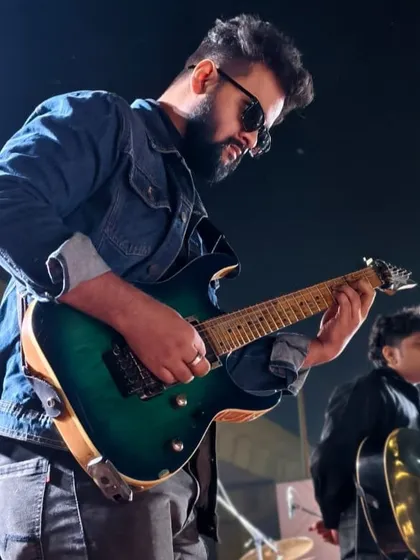 From classroom practice to stage performance, we guide our students every step of the way. This is one of our advanced students showcasing their skills on the electric guitar, a popular choice in our Western music curriculum.