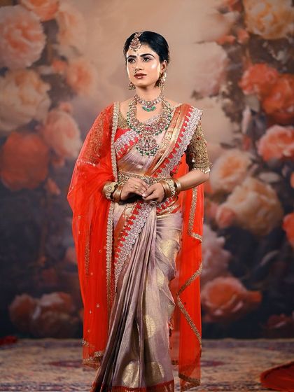 A stunning bridal portrait against a floral painted backdrop. This setup combines traditional attire with a soft, romantic background, showing the versatility of our sets for different bridal themes.