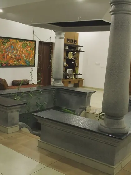 Seeing my art become a part of a home's architecture is the greatest reward. This 'Anandashayanam' mural fits perfectly within the traditional 'nalukettu' courtyard, creating a serene and timeless atmosphere.