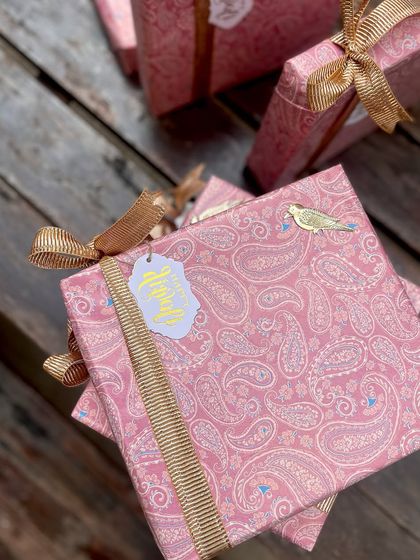 A closer look at the plush paisley wrapping, showcasing the rich textures and thoughtful details of my festive packaging.
