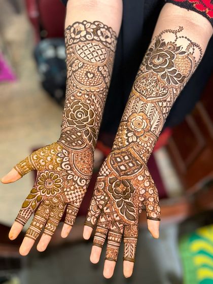 A full view of a beautiful non-bridal design, featuring a mix of florals and traditional patterns.