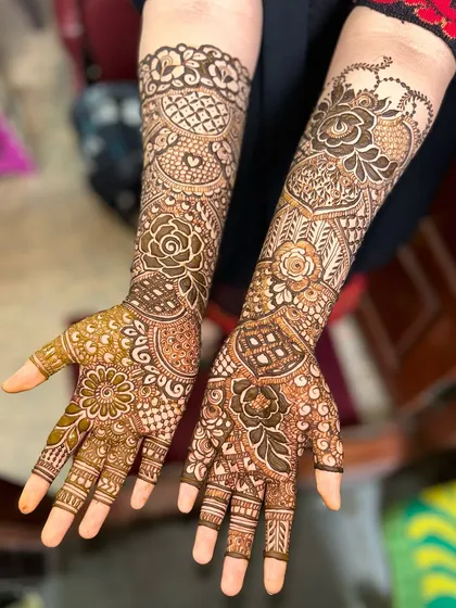 A full view of a beautiful non-bridal design, featuring a mix of florals and traditional patterns.
