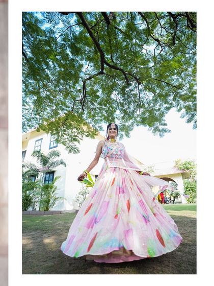 A joyful, twirling shot of the bride at her Haldi ceremony. I love capturing these dynamic and happy moments that show the bride's excitement.