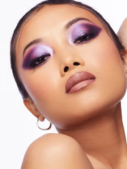 A close-up of the purple smokey eye, showing the flawless blending and the beautiful contrast of light and dark shades.
