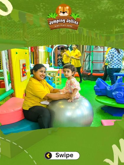 One of our team members interacting with a toddler on a large yoga ball. We provide a supervised environment to ensure all children are safe and engaged.