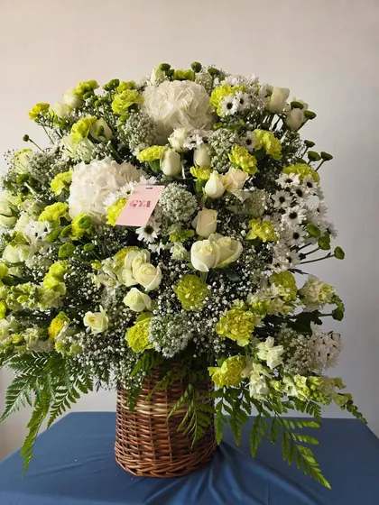 This perspective emphasizes the height and fullness of the arrangement, making it a true statement piece.
