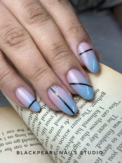 Another angle of the airbrush ombré nails, highlighting the smooth gradient and the clean, modern lines that add a graphic element to the design.