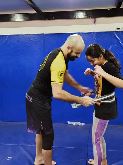 You can see the pride on her face. This is a huge moment that recognizes her dedication and toughness, especially training in a class that is 80% male.