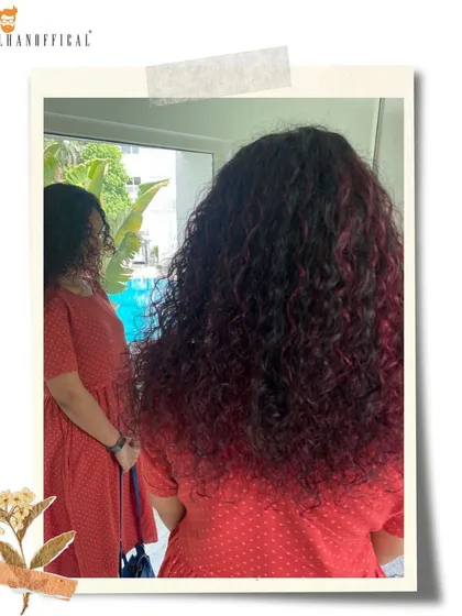 Who says you can't have bold color on curly hair? I love challenges like this, creating a captivating deep red magenta that makes every curl pop while keeping the hair nourished and defined.