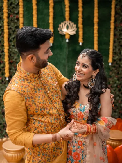 The joy is infectious. We focus on capturing the genuine smiles and happy interactions between the couple during their pre-wedding festivities.