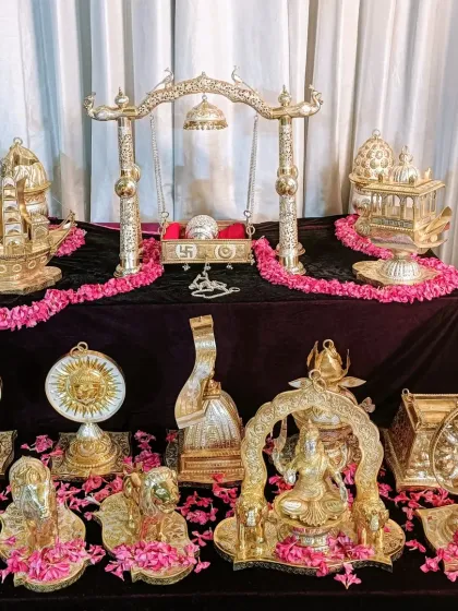 The intricate details of a Simant ceremony are so beautiful. This display of traditional silver items, adorned with fresh flowers, was a centerpiece of the sacred rituals we conducted.