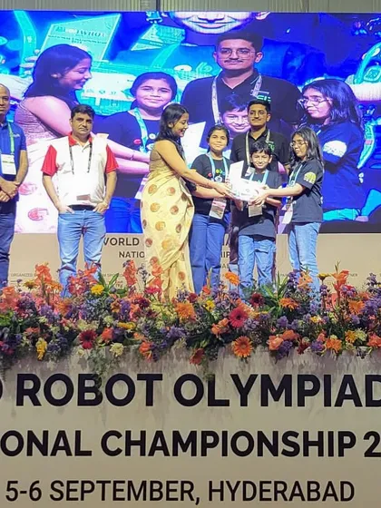 Team Ecobots from Jamnagar receiving the "Team Spirit Award" at the WRO 2025 National Championship. The judges commended their impeccable teamwork and innovative spirit.