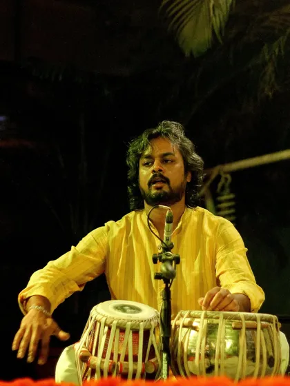 Playing at the Courtyard Baithak series, accompanying Ustad Rafique Khan saheb.