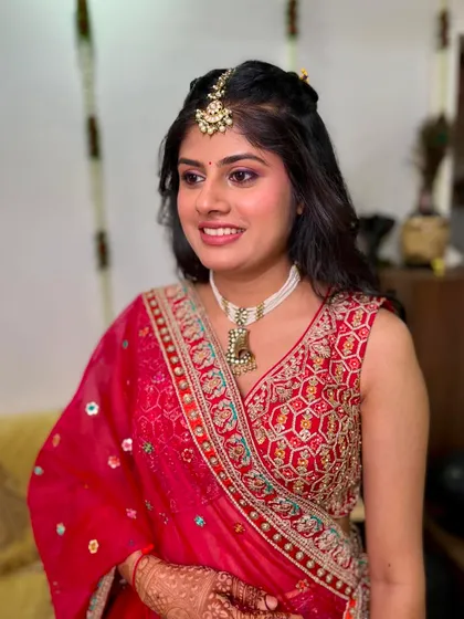 A happy and radiant client during her pre-wedding festivities. The makeup is designed to be long-lasting and picture-perfect.