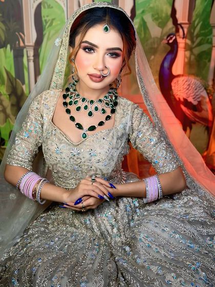 A portrait of the bride with a soft, nude lip. This creates a more understated and elegant look.